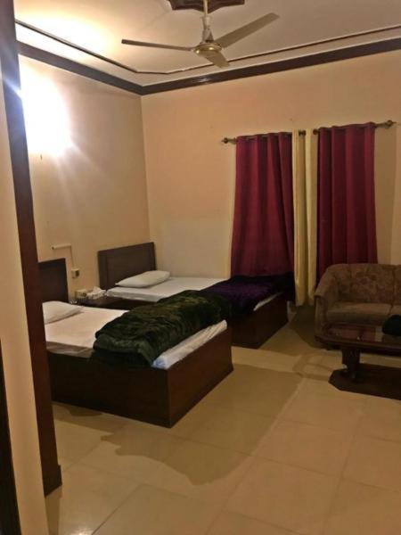 Hotel Babar House Faisalabad Exterior foto